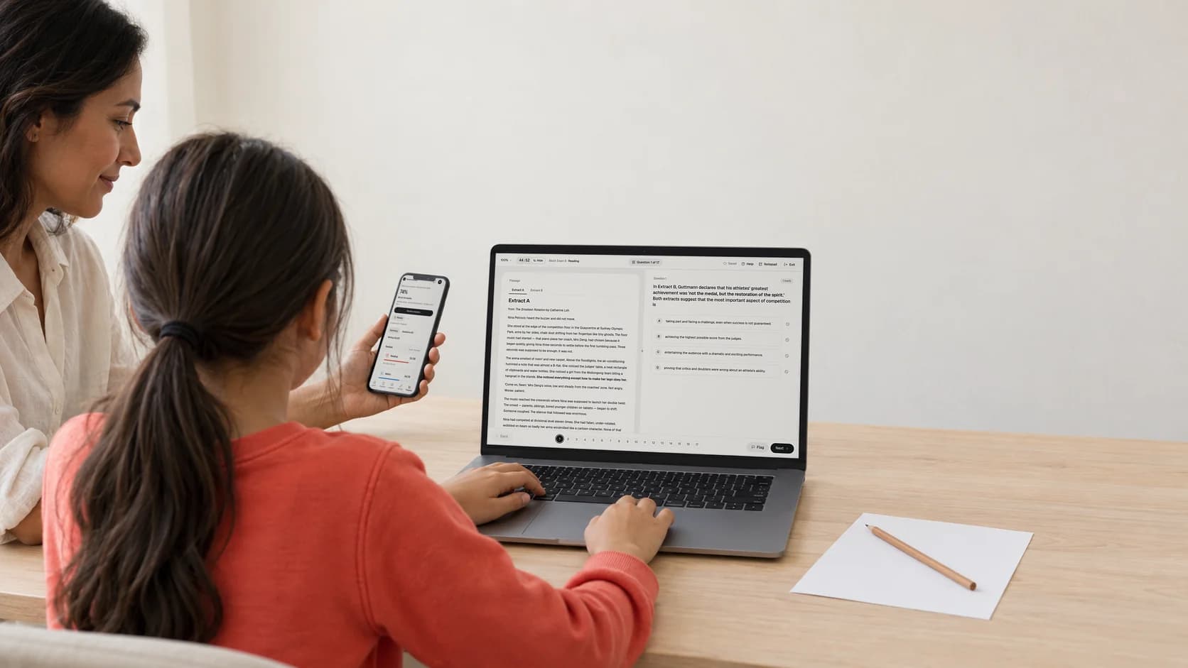 A child works through a Reading question on SelectiveReady on a laptop while a parent beside them follows along on a phone.